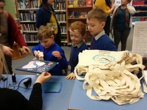 3 boys checking